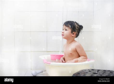 How a young girl take a bath in bathroom. Watch this video you .